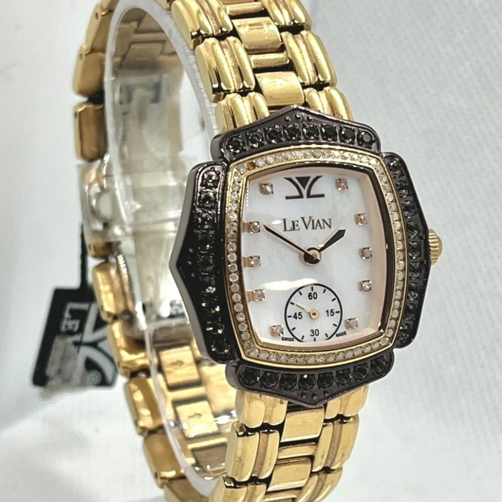 LEVIAN GOLD SWISS WATCH W CHOCOLATE AND VANILLA DIAMONDS & MOTHER OF PEARL.